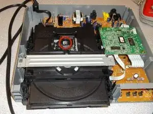 How to clean the Magnavox MWD200F optical lens