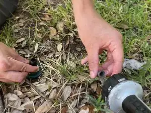 How to Clean Calcium Deposits From a Sprinkler Head