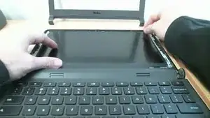 Lift the LCD out from within the frame and carefull flip the LCD over slowly torward you and set it ontop of the keyboard.