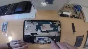 Remove the 6 trackpad screws with a Phillips #0 screwdriver