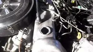 Now watch as the engine runs. Check for smoke coming out of the oil fill hole.