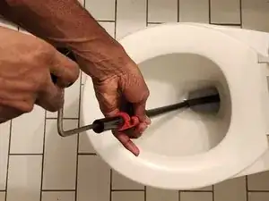 How to Unclog a Toilet with an Auger