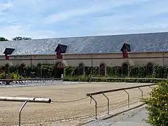 Sand quarry, with stables at the back.