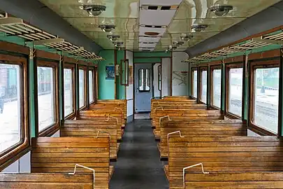 Interior of a control car with wooden seats