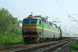 Electric locomotive ChS8-069 with passenger train near Orlovka, Gorodishchensky District