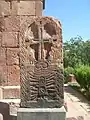 Khachkar with twelve arms (below cross) representing the Twelve Apostles at the Last Supper