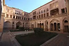 Gardens and a pool in the central yard of the Abbāsi House.