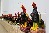 Cock statuettes that people use for worshipping Phan Thai Norasing