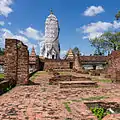 Main prang and surrounded pagodas with royal dharma practice monastery