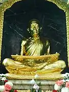 A statue of Ariyavangsagatayana (Sa Pussadeva), the first abbot of this temple