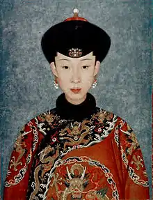 In ceremonial dress