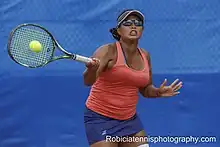 Photo of Irina Ramialison playing at the ACT Claycourt International #1 in Canberra