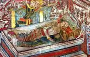 Detail of Siddharta looking in at his sleeping wife and child before leaving. Thai mural.