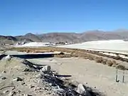 Piles of lime dust sit just south of Trona on the Trona Railway.