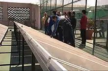 Image 56Participants in a workshop on sustainable development inspect solar panels at Monterrey Institute of Technology and Higher Education, Mexico City on top of a building on campus. (from Solar energy)