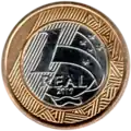 Brazilian R$1 coin, a stainless steel center in a bronze plated steel ring.