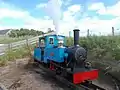 Alan Keef 2-6-0TT 'Bunty' stands on the turnable at Etal Station and whistles prior to moving off