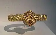 11th-century gold Fatimid armlet, inscribed with good wishes in the Kufic script (Syria)