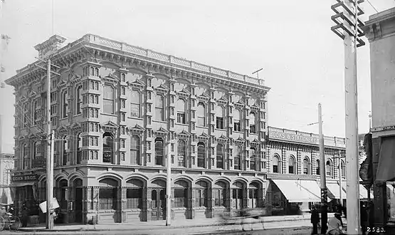 Spring St. side of Temple Block, sign for Cohn Bros. store, mid-1890s.