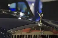 Front grille (top) of a 1972 Silver Shadow, showing Rolls-Royce's trademark bonnet mascot, and the double R logo below it