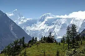  A view of Belukha Mountain. It is located in the Katun Mountains and is the highest peak of the Altai Mountains in Russia, and is the highest of the system of the South Siberian Mountains.