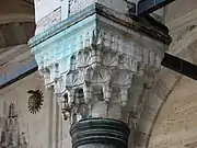 One of the muqarnas-carved capitals in the courtyard