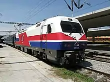 Siemens/Henschel HellasSprinter electric locomotive 120-016 of OSE entering Thessaloniki station with train 335 from Belgrade, May 2007