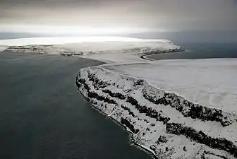 The eastern end of Bennett Island with its glaciated tombolo in the background