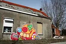 Street art by Ces53 in Doel. Since the depopulation of Doel, it is attracting street artists.