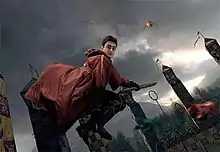 A scene from the film that accompanies the ride which features Harry Potter as portrayed by Daniel Radcliffe riding a broomstick.