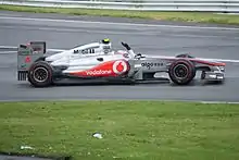 McLaren driver Jenson Button celebrating his victory in the Canadian Grand Prix