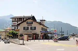 Three-story building with gabled roof