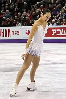 An inside spread eagle (Mao Asada)