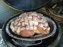 uncooked bacon wrapped turkey