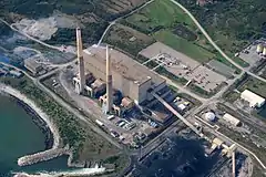 The twin smoke stacks at Lingan Generating Station.