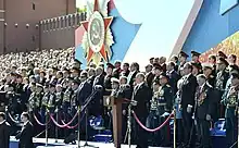 Putin among the veterans and officials.