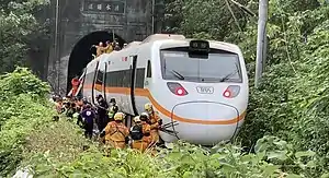 The derailed Taroko Express trainset, as seen from outside the entrance to the tunnel