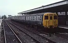 Looking north. A British Rail Class 503 Merseyrail train at Rock Ferry, in 1983. Buffers are just off the bottom of the picture.