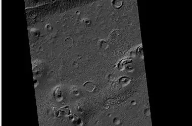 Wide view of a field of ring mold craters, as seen by HiRISE under HiWish program