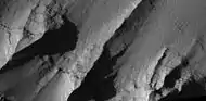 Layers in a section near the top of wall in Noctis Labyrinthus, as seen by HiRISE under HiWish program.