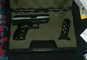 Hi-Point CF380 pistol with two-tone finish; the C-9 is identical except it is simply black, and chambered for 9x19mm Parabellum