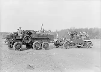 A modernized 3-incher of 6th HAA Bde towed by an AEC truck, 1934