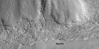 Close view that displays the thickness of the mantle, as seen by HiRISE under HiWish program