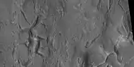 Close view of fractures from the previous image, as seen by HiRISE under HiWish program