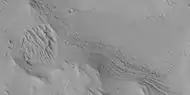 Close view of layers along edge of pedestal crater from previous image, as seen by HiRISE under HiWish program