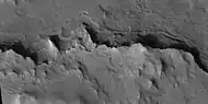 Close view of layered features, as seen by HiRISE under HiWish program