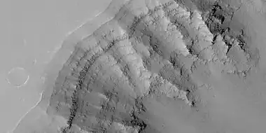 Close view of layers in Louros Valles, as seen by HiRISE under HiWish program  Note this is an enlargement of a previous image.