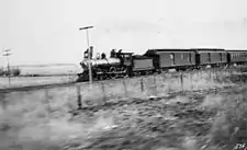 An AT&SF passenger train in operation, c. 1895