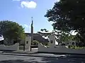 Padua College entrance gate, with Saint Therese Catholic Church, Turner Road (2021).