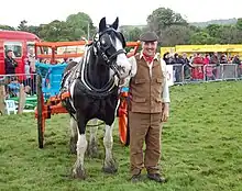 Image 7Mr Pack dressed in traditional Yorkshire attire takes his horse, Danny, for a turn of the field in front of the crowd at Otley Show. (from Culture of Yorkshire)